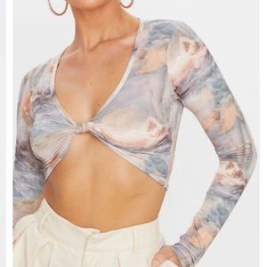 Pretty little thing renaissance printed twist front long sleeve crop top